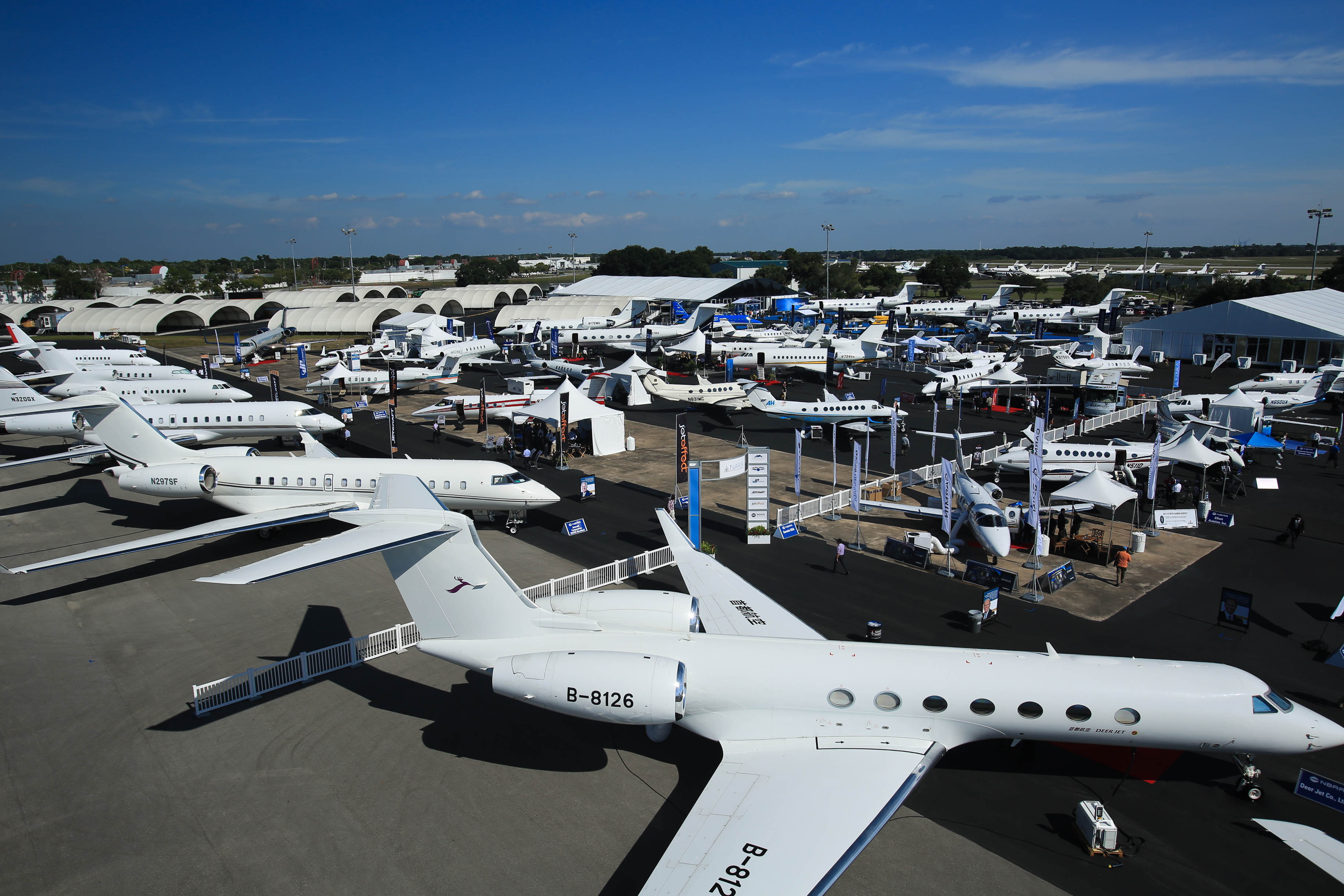 Business jets on static display at an aviation event